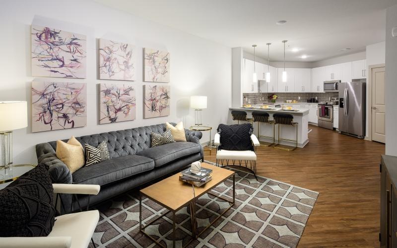 a living room with a couch and a table