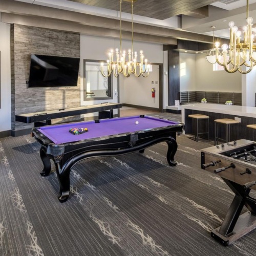game room with billiards and foosball